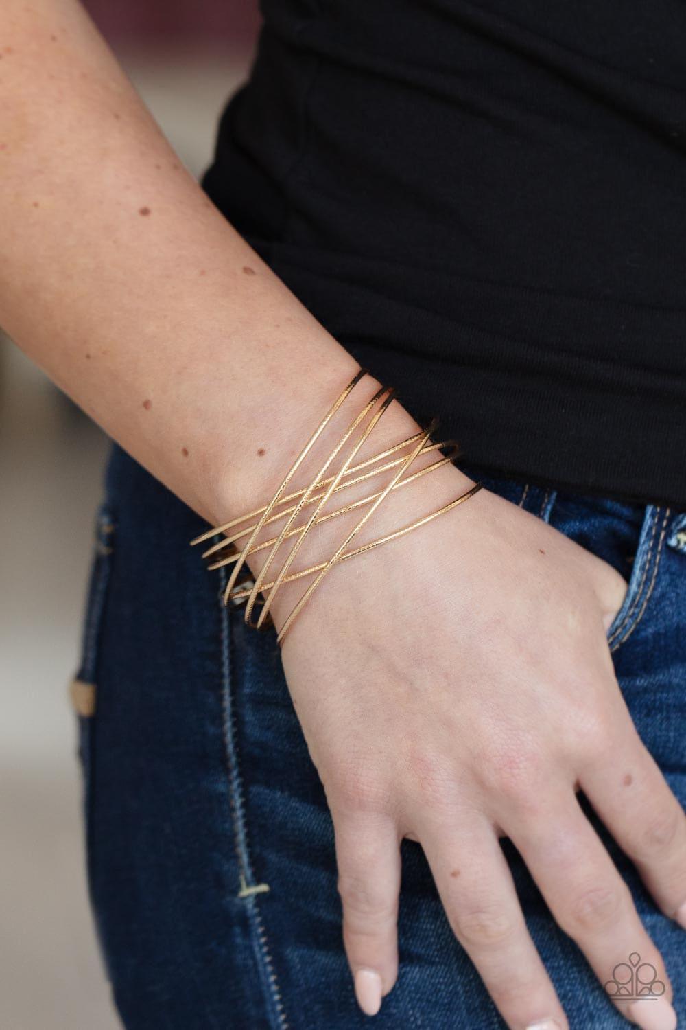 Paparazzi Accessories - Strike Out Shimmer - Gold Cuff Bracelet - Bling by JessieK