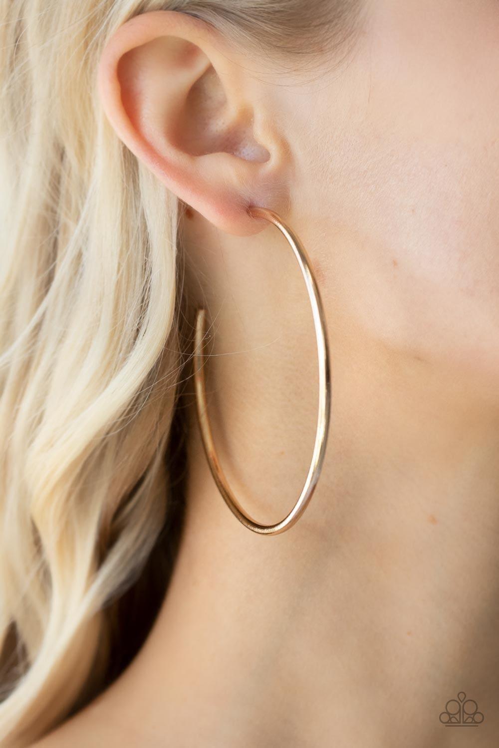 Paparazzi Accessories - Mega Metro - Gold Hoop Earrings - Bling by JessieK